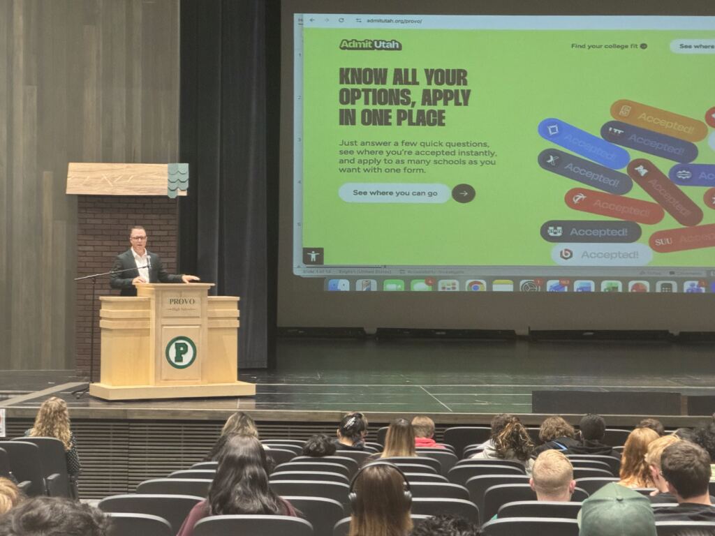 Kris Coles presenting at Admit Utah lanch