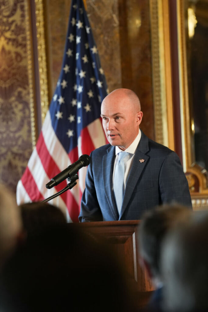 Governor Cox speaking at the signing event.