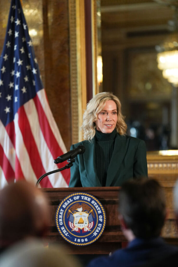Board Chair Amanda Covington speaking at the signing event