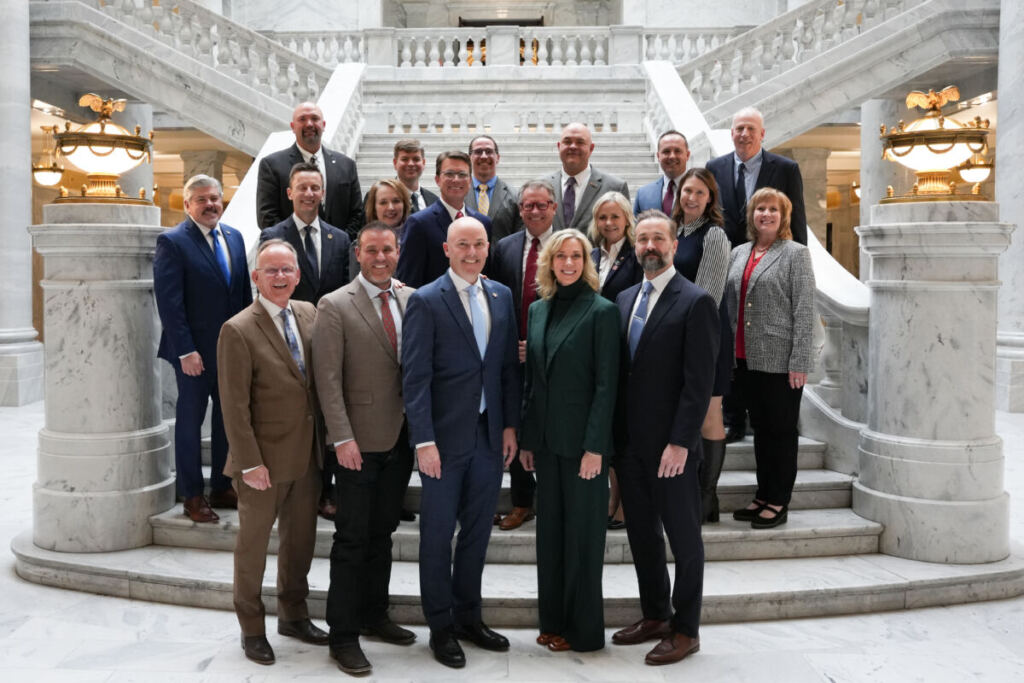 All presidents, board members, and legislators present at the signing event.