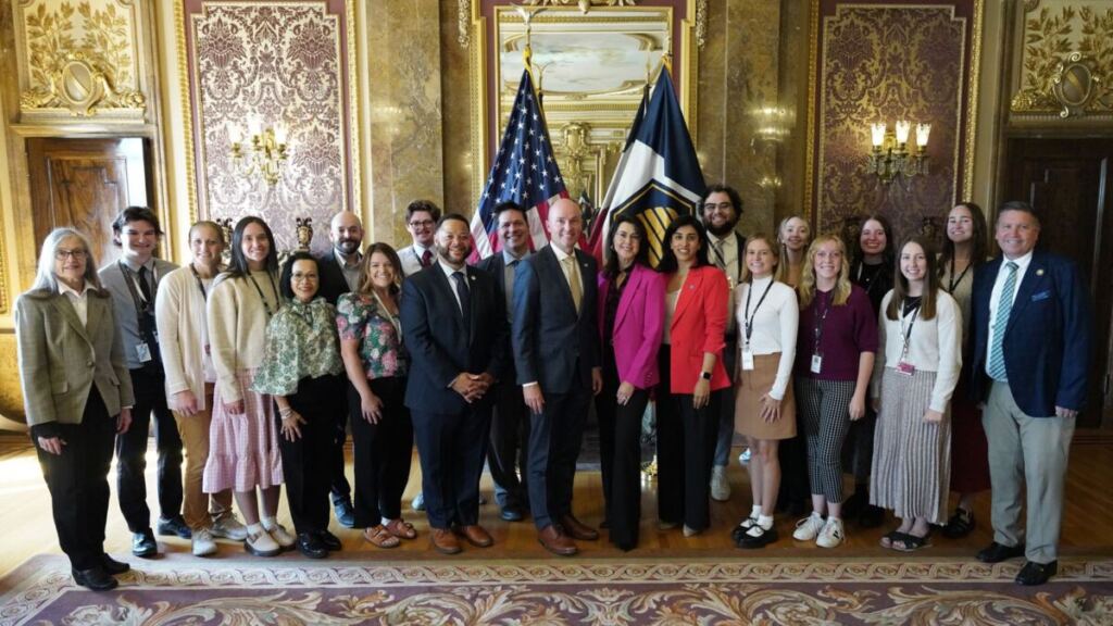 Group photo of One Utah Service Fellowship leaders, fellows, state officials, and community partners at the Utah State Capitol during the inaugural swearing-in ceremony for the first OUSF cohort